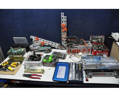 A TRAY OF TOOLS to include a tin of vintage gauges, socket sets, a Bosch cordless shape and edge trimmer (PAT pass and workin