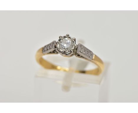 A YELLOW METAL SINGLE STONE DIAMOND RING, designed with a claw set round brilliant cut diamond, estimated total diamond weigh