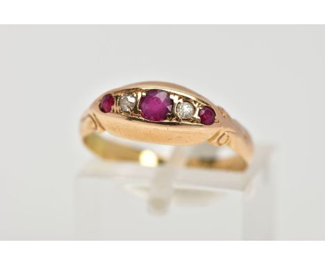 AN EARLY 20TH CENTURY, 18CT GOLD RUBY AND DIAMOND BOAT RING, designed with three circular cut rubies, interspaced with two ol