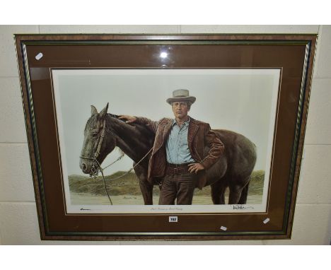JAMES BAMA (AMERICAN 1926) 'PAUL NEWMAN AS BUTCH CASSIDY', a limited edition print signed by Paul Newman and the artist, fram