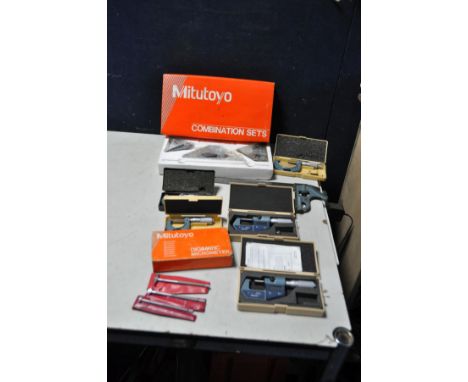 A COLLECTION OF MITUTOYO TEST AND MARKING EQUIPMENT comprising of a boxed an unopened combination square set, two digital mic