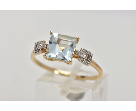 A 9CT GOLD AQUAMARINE RING, centring on a four claw set, square cut aquamarine, to colourless spinel set shoulders, thin plai