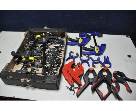 A TRAY CONTAINING A LARGE COLLECTION OF CLAMPS including spring clamps, bar clamps and quick grip clamps by company's such as