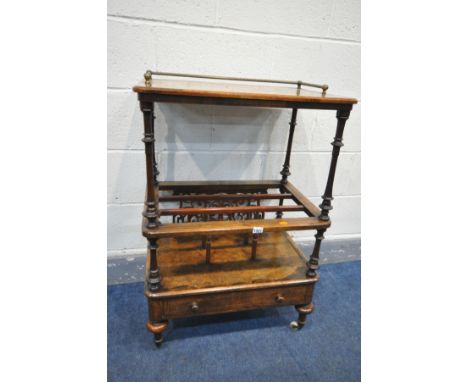 A VICTORIAN BURR WALNUT AND INLIAD CANTERBURY, the brass gallery top, on turned supports, triple spindled division, open fret