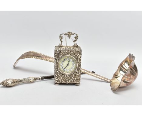 A SILVER CASED CARRIAGE CLOCK, BUTTON HOOK AND A LADLE, the carriage clock detailed with an embossed floral and foliate desig