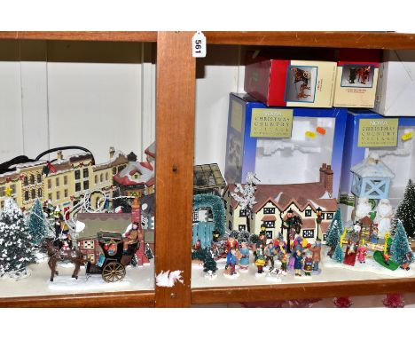 A THIRTY PIECE CERAMIC AND RESIN CHRISTMAS VILLAGE, items from different manufacturers to include three boxed Noma porcelain 