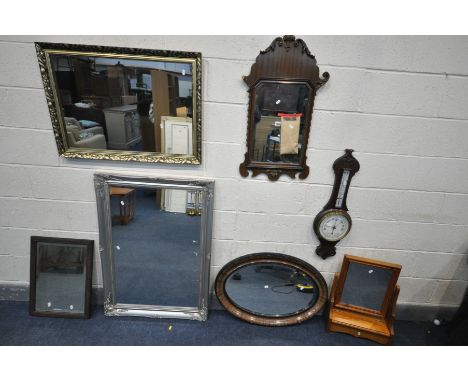 A REGENCY STYLE MAHOGANY FRETWORK WALL MIRROR, 45cm x 83cm, an Edwardian oak aneroid barometer, a silver framed bevelled edge