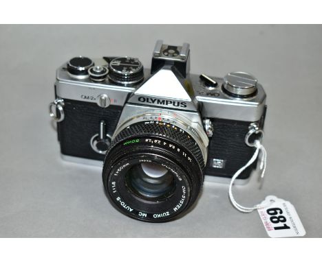 AN OLYMPUS OM-2N 35MM SLR CAMERA, fitted with an Olympus f1.8 50mm lens (Condition report: appears to be in good condition, w