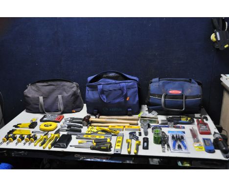 THREE BAGS OF TOOLS to contain various hand tools, hammers allen keys, circlip pliers, drill bits, spirit level, screwdrivers