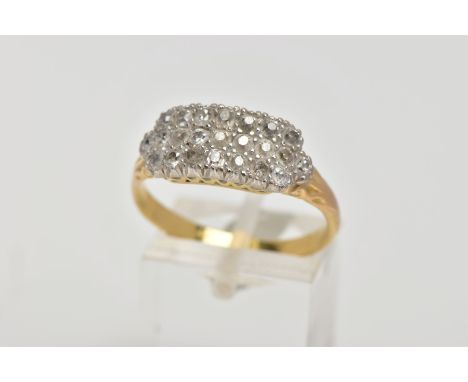 A YELLOW METAL DIAMOND RING, designed with a row of old cut diamonds (one round brilliant cut replacement diamond), milgrain 