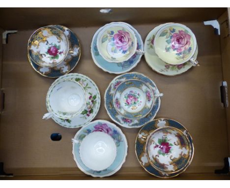 Seven tea cup and saucer sets, mostly Paragon with a Foley and Royal Albert example (1 tray).