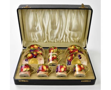 ROYAL WORCESTER; a cased set of six fruit painted coffee cups with saucers, the majority signed Moseley.Condition Report: All