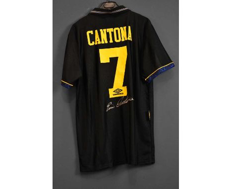 ERIC CANTONA; a signed Manchester United retro-style football shirt, 'Kung Fu Kick shirt', signed to the reverse, size L.Cond