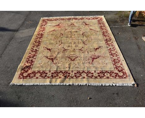 A large Chinese cream ground carpet with floral decoration, 420 x 310cm.