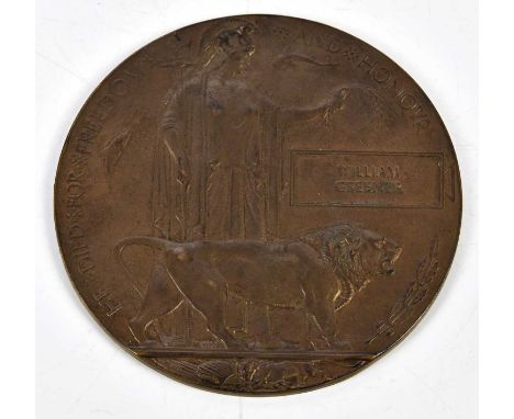 A WWI bronze memorial plaque awarded to William Greener.