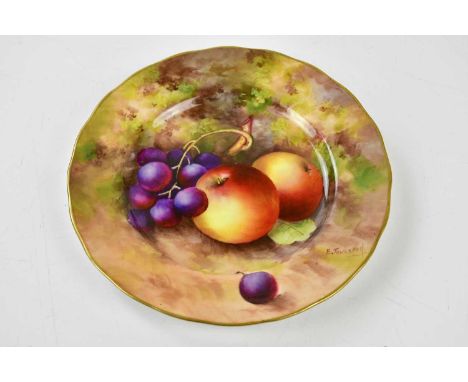 E. TOWNSEND FOR ROYAL WORCESTER; a hand painted side plate decorated with fruit, signed, diameter 16cm.