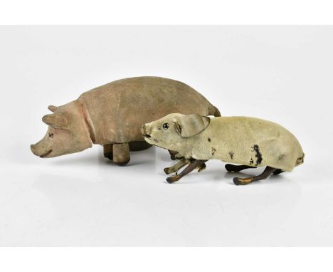 A vintage clockwork leather automation pig, possibly by Roullet et Decamps, length 26cm, together with a clockwork model of a