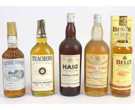 WHISKY; four bottles, including Haig Blended Scotch Whisky, Dewar's White Label, and a single bottle Southern Comfort liqueur
