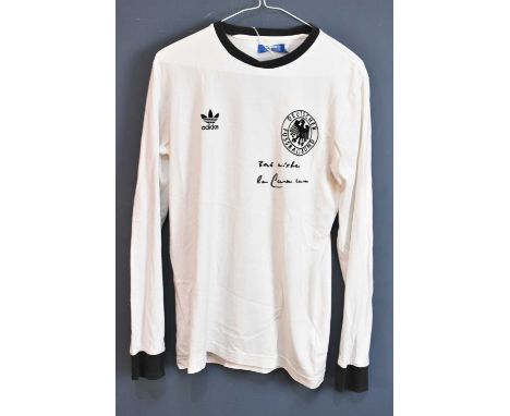 BECKENBAUER; a signed Germany retro-style football shirt, signed and inscribed to the front 'Best Wishes', size S.Condition R