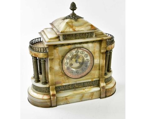 A Victorian marble mantel clock with applied gilt metal detail with acorn finial and various plaques decorated with classical
