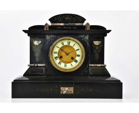 A Victorian slate mantel clock, the white enamel dial set with Roman numerals, height 32cm.