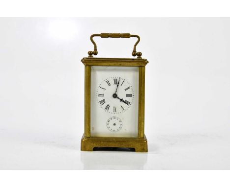 Two brass cased carriage clocks, both with white enamel dial, one face af, one set with subsidiary dial, both with Roman nume