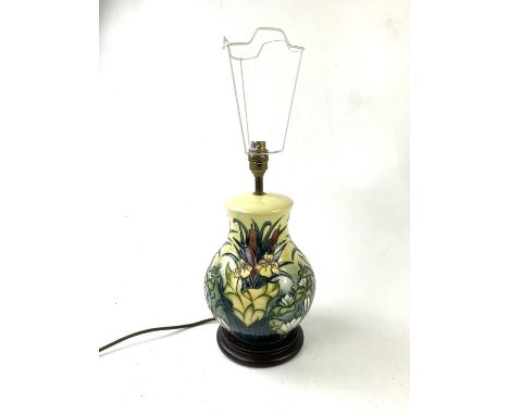 MOORCROFT; a baluster table lamp in the 'Lamia' pattern, on turned wooden plinth base, height including fitting 35cm.Conditio