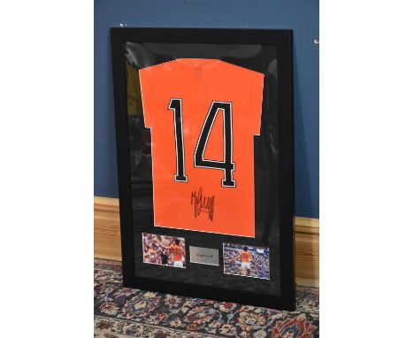 JOHANN CRUYFF; a signed Netherlands retro-style football shirt, 57 x 80cm, framed and glazed.Condition Report: Creasing and l