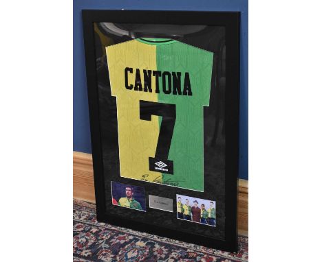 ERIC CANTONA; a Newton Heath Manchester United retro-style football shirt, signed, 57 x 80cm, framed and glazed.Condition Rep