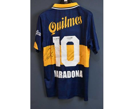 DIEGO MARADONA; a signed Boca Jrs Quilmes retro-style football shirt, signed to the reverse, size L.Condition Report: Creasin