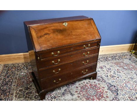 A 19th century mahogany bureau with fall front, above four long drawers on bracket feet, width 99cm.