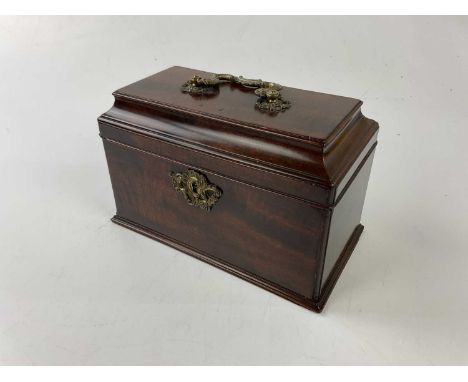 A 19th century mahogany tea caddy with brass handle, width 24.5cm.