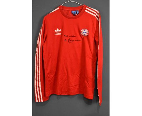 BECKENBAUER; a signed Bayern Munich retro-style football shirt, signed and inscribed to the front 'Best Wishes', size M.Condi