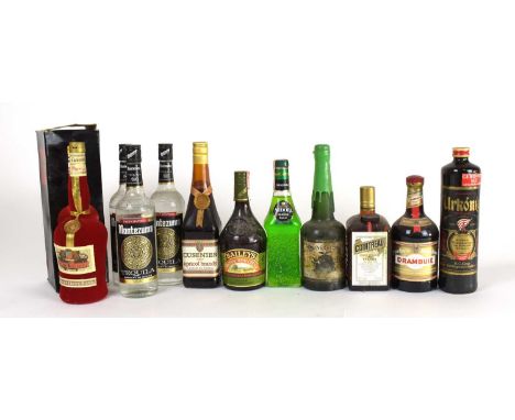 MIXED SPIRITS; eleven bottles, including three bottles Montezuma Tequila, Cointreau, Drambuie, etc (11)