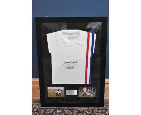 PELÉ (EDSON ARANTES DU NASCIMENTO); a framed 'Escape to Victory' retro-style football shirt, signed and including 'Good Luck'