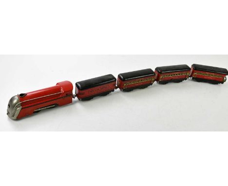 MARX TOYS; a tin plate locomotive with five New York Central and Pullman carriages.