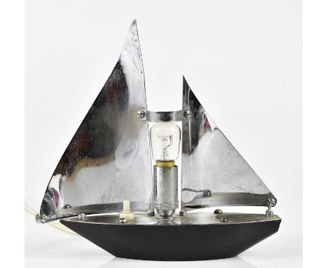 A small chrome lamp modelled as a yacht, height 22cm.