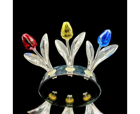 SCS member renewal gift. Includes silver arched base. A red, blue, and yellow crystal tulip with clear leaves. Item includes 