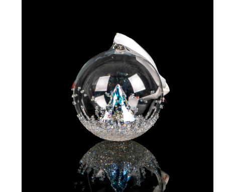 A glass ball with a tree crystal moonlight and decorated with sparkling crystal rock n exterior. Swarovski backstamp. This it