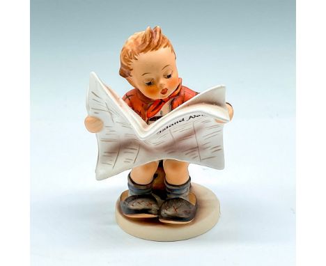 Little figural holding newspaper, reading in his father's slippers. Goebel backstamp. M.I. Hummel impressed mark. 184. This i