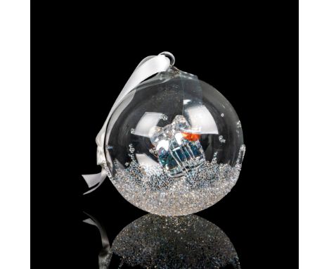 Glass ball part of Christmas Balls collection, made of clear crystal with a gift in crystal moonlight on the interior. Swarov