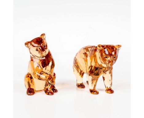 Pair of lead crystal annual edition made to be displayed with Bear Arcadia. Artist signature to bottom. Swarovski etched back