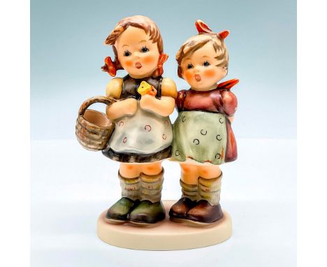 Hand painted figure of sisters. Goebel backstamp. This item has its original box: 7"L x 5.25"W x 3.5"H. Artist: M.I. HummelIs