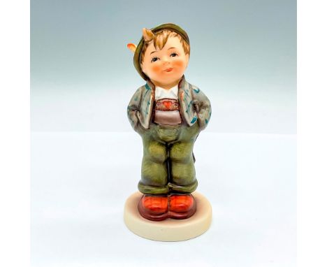 Hand painted exclusive edition figure of a young boy smiling. Goebel backstamp. This item has its original box: 5"L x 3.75"W 