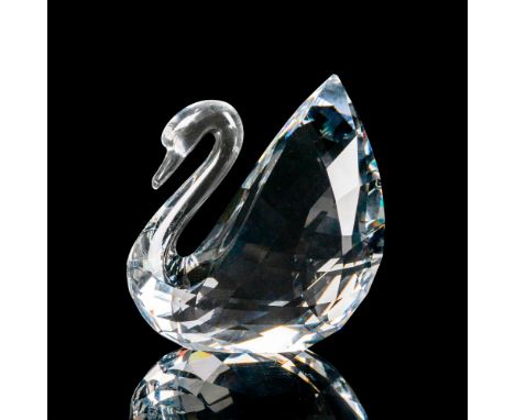 Lead crystal figure modeled as the iconic Swarovski brand logo. Swarovski etched backstamp. This item has its original box. B