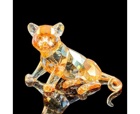 Shimmers in fully facetted golden shine crystal with satin crystal stripes. Item comes with original box measuring 4.75"L x 5