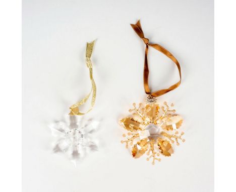 Lead crystal pieces part of the Christmas Ornaments Collection, made from gold shadow and clear crystal with fabric ribbon. S