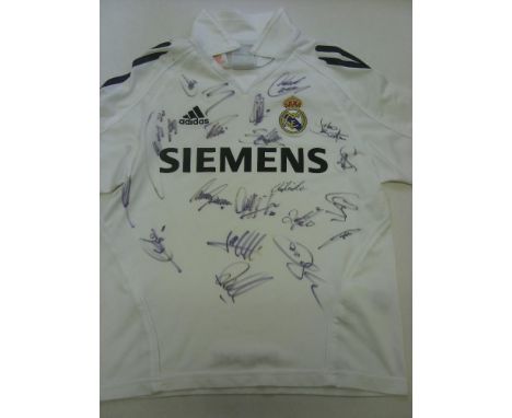 Real Madrid, an autographed replica child's home shirt, fully signed by 20 players, including Beckham, Ronaldo &amp; Zidane, 