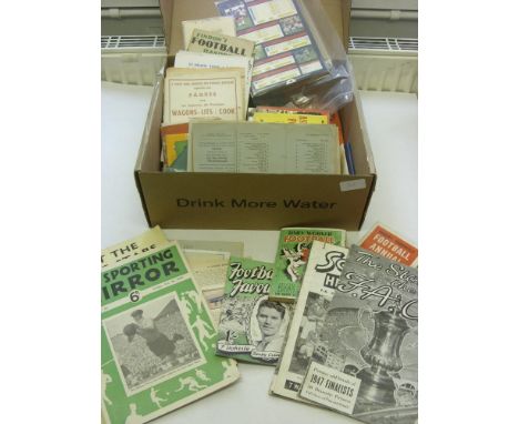 A collection of Sporting memorabilia, to include 40 football annuals and booklets from the 1940's, Trade Cards include Topica