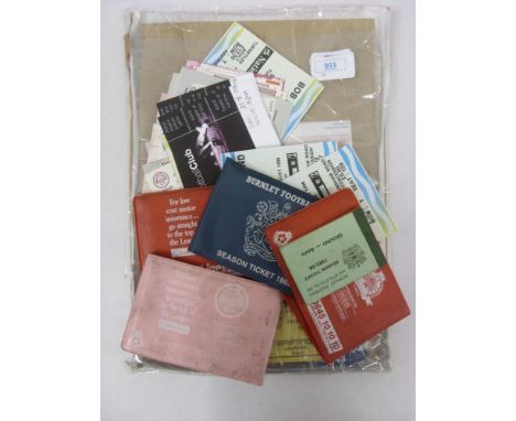 A collection of 61 Burnley home/away football match tickets, from the 1970's to 2000's, plus 9 season ticket books, from the 